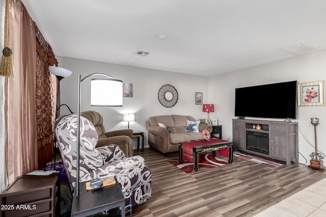711 E Laurel Dr Unit 17, Casa Grande, AZ 85122 - living room featuring wood finished floors and visible vents
