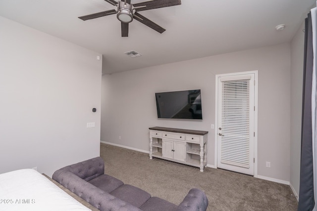 living room with carpet floors and ceiling fan