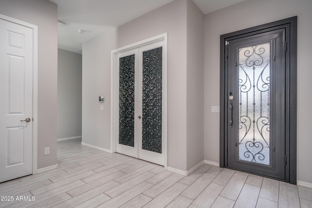 foyer featuring french doors