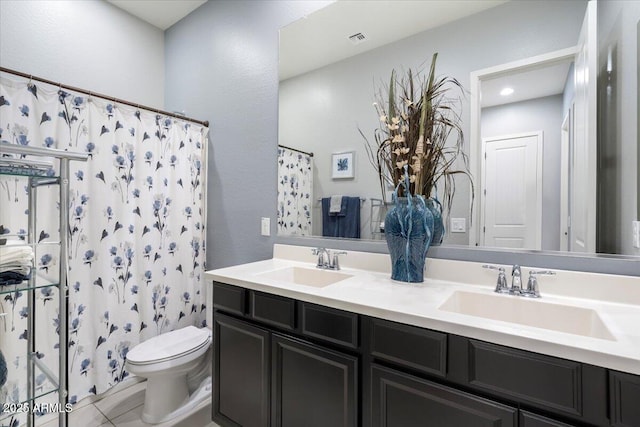 18577 W Coolidge St, Goodyear, AZ 85395 - bathroom with toilet, double vanity, tile patterned flooring, a shower with curtain, and a textured wall