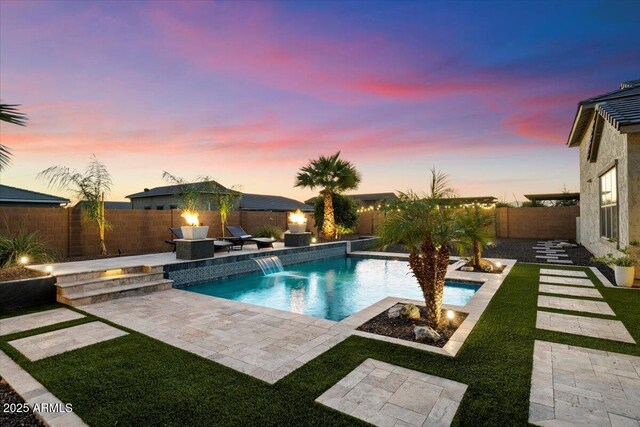 18577 W Coolidge St, Goodyear, AZ 85395 - view of swimming pool featuring a fenced backyard and a patio area