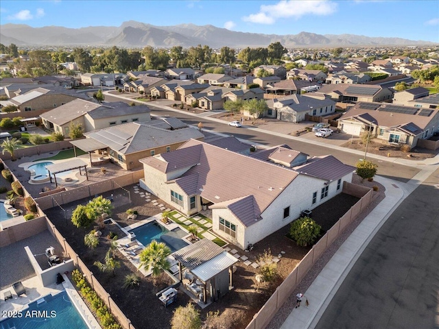18577 W Coolidge St, Goodyear, AZ 85395 - aerial view of residential area with a pool area and a mountainous background