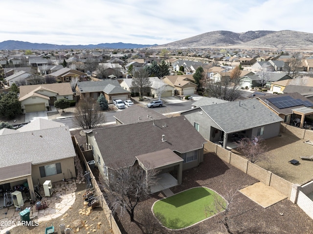 bird's eye view featuring a mountain view and a residential view