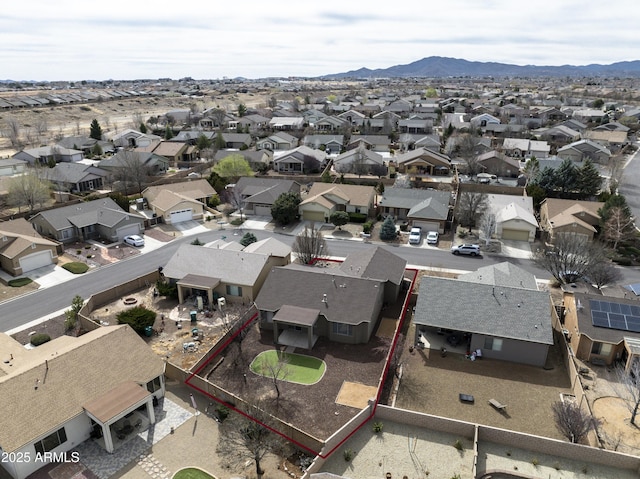 aerial view featuring a mountain view and a residential view