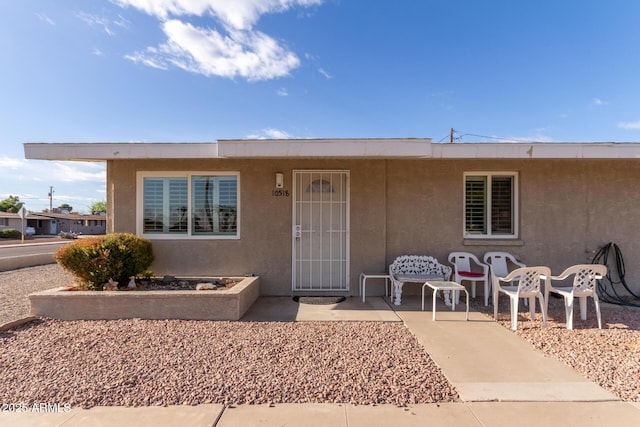 view of front of home with a patio area