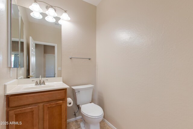 7421 S 25th Ln, Phoenix, AZ 85041 - half bath with toilet, vanity, and tile patterned flooring