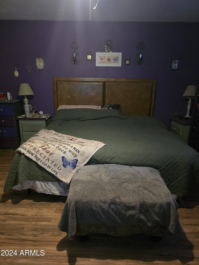 bedroom featuring hardwood / wood-style flooring