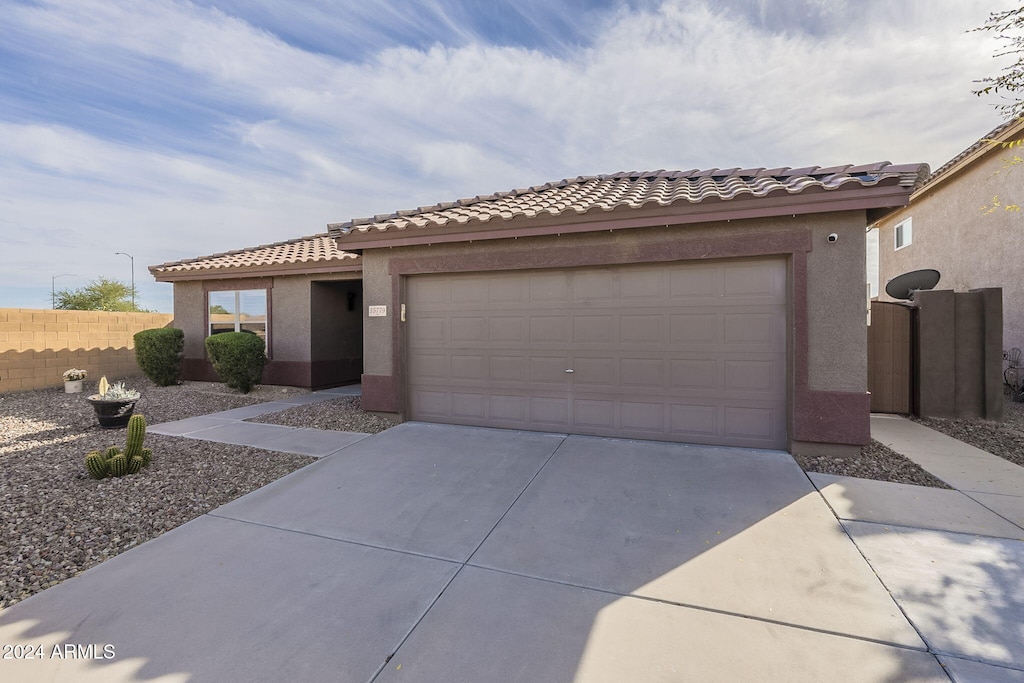 view of front of home with a garage