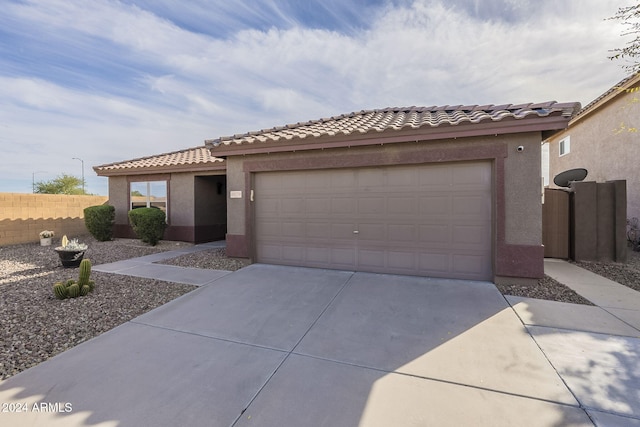 view of front of home with a garage