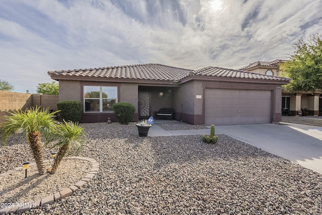 view of front of property with a garage