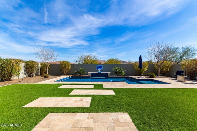 view of swimming pool with a fenced backyard, a patio, a fenced in pool, and a yard