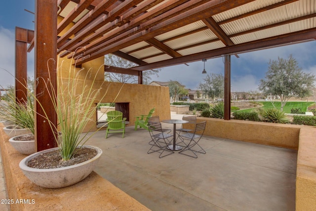 view of patio featuring outdoor dining area