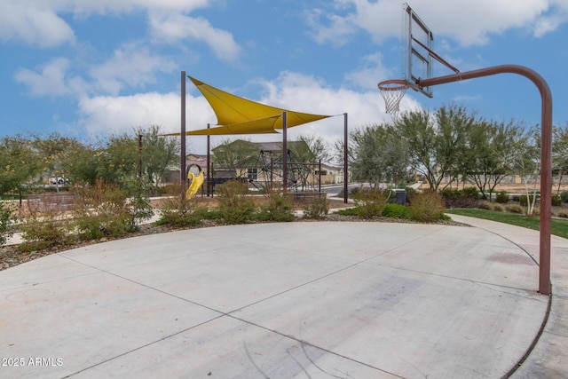 view of sport court with community basketball court and playground community