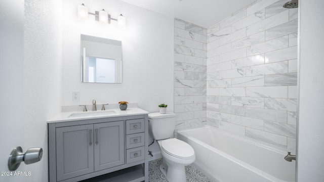 full bathroom with vanity, tiled shower / bath combo, and toilet