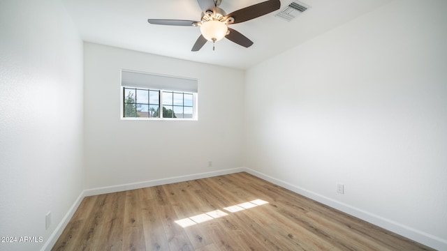 unfurnished room with ceiling fan and light hardwood / wood-style flooring