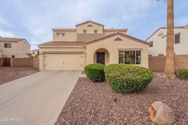 13318 W Indianola Ave, Litchfield Park, AZ 85340 - mediterranean / spanish home featuring a tiled roof, stucco siding, driveway, and an attached garage