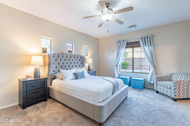 13318 W Indianola Ave, Litchfield Park, AZ 85340 - bedroom featuring light carpet, baseboards, and a ceiling fan