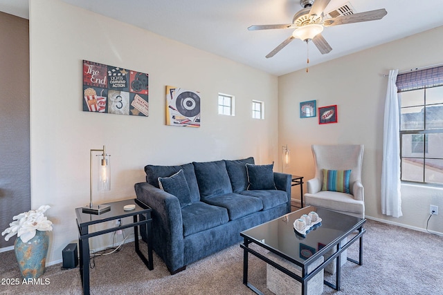 13318 W Indianola Ave, Litchfield Park, AZ 85340 - carpeted living area featuring ceiling fan and baseboards