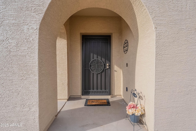 13318 W Indianola Ave, Litchfield Park, AZ 85340 - doorway to property featuring stucco siding