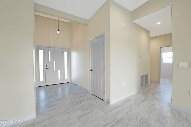 entrance foyer featuring visible vents and baseboards