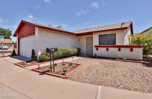 ranch-style house with stucco siding and concrete driveway