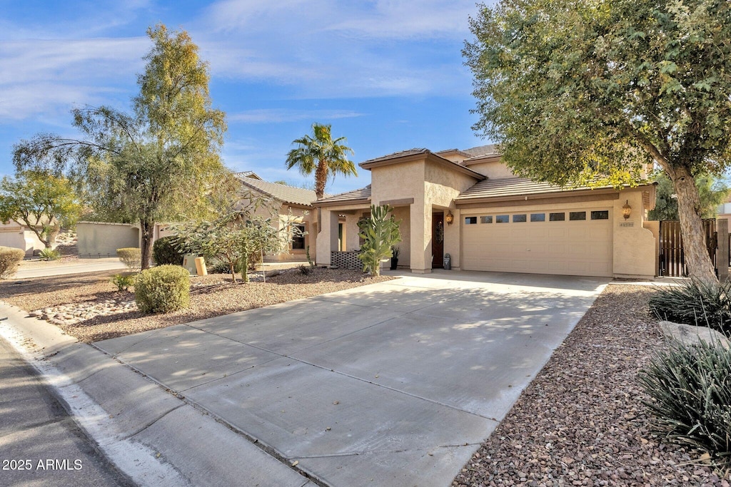 view of front of home with a garage