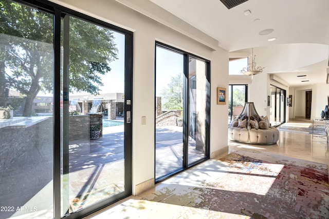 doorway to outside with plenty of natural light