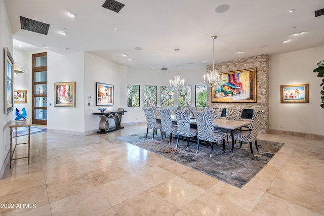 tiled dining area with a notable chandelier