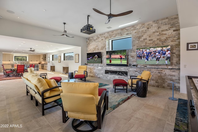 tiled living room featuring ceiling fan