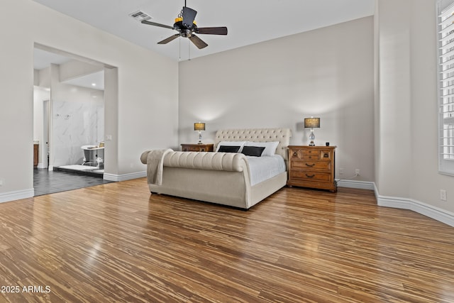 bedroom with hardwood / wood-style floors and ceiling fan