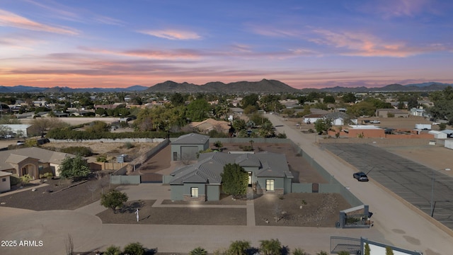 aerial view at dusk with a mountain view