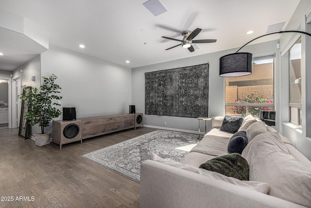 living area with recessed lighting, baseboards, a ceiling fan, and wood finished floors