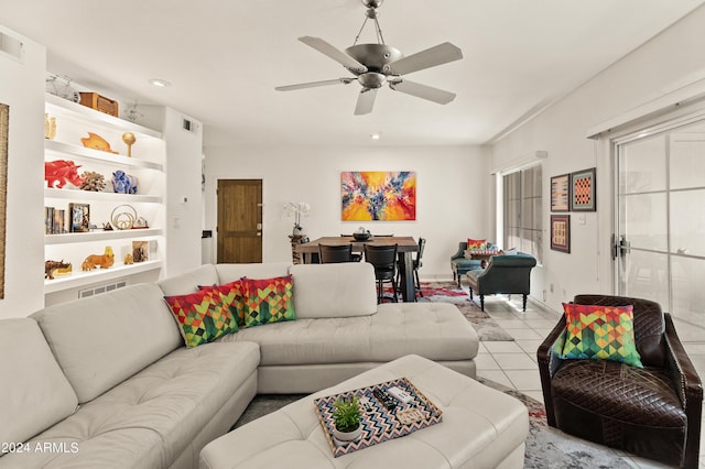 living room with light tile patterned floors, recessed lighting, and ceiling fan