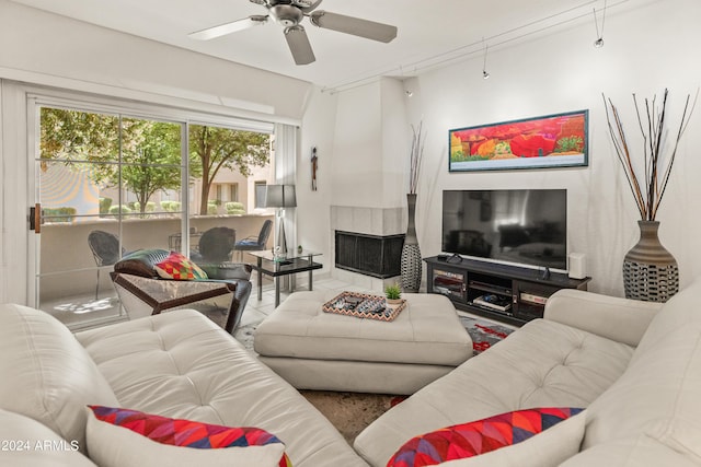 living room with a ceiling fan