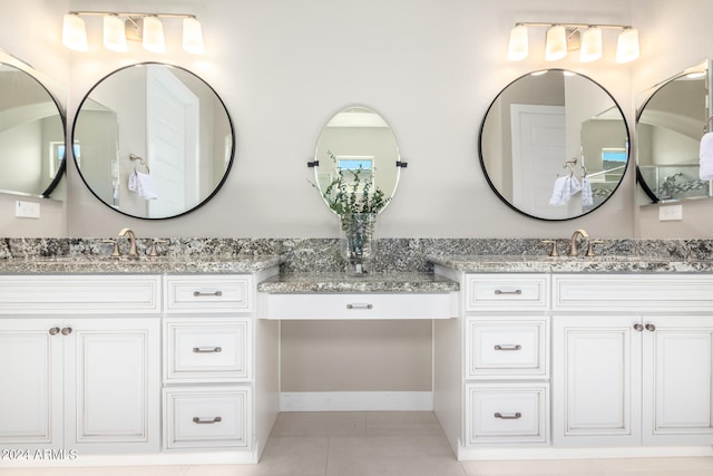 bathroom featuring vanity and tile patterned floors