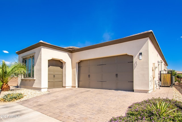 view of front of property with a garage