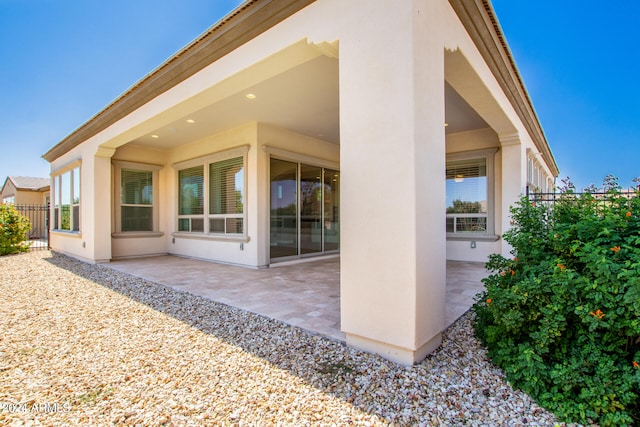 rear view of property with a patio area