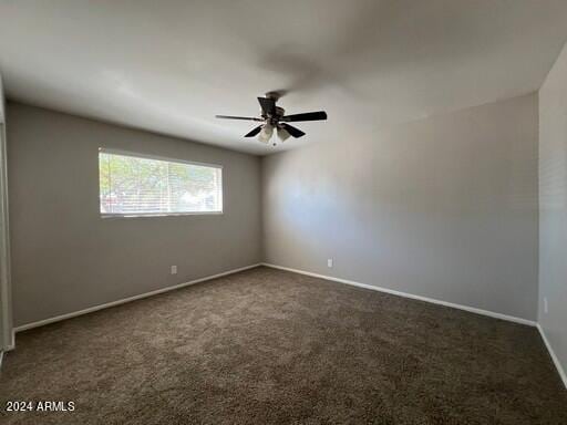 carpeted empty room with ceiling fan