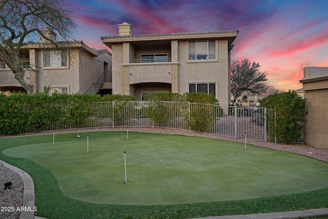 surrounding community featuring fence