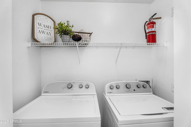 washroom with washer and dryer and laundry area