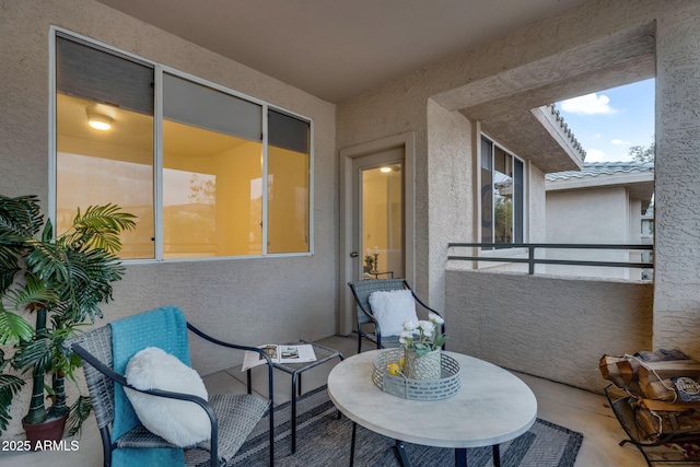 view of patio with a balcony