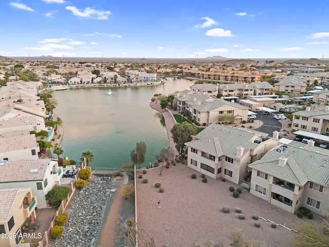 bird's eye view with a residential view and a water view