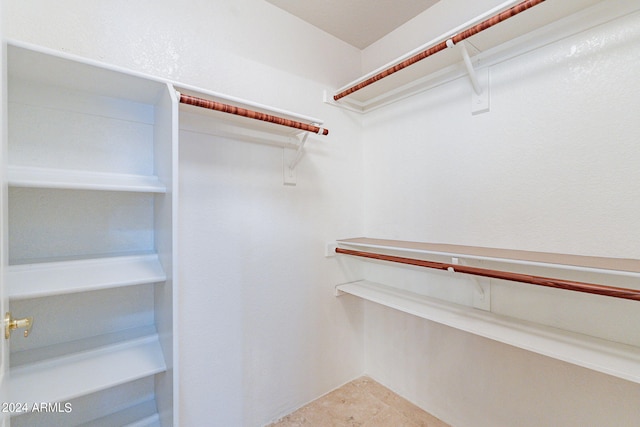 walk in closet featuring tile patterned floors