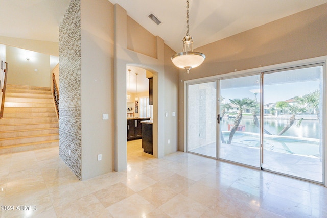 empty room with high vaulted ceiling