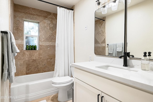 full bath with tile patterned floors, toilet, shower / bath combo with shower curtain, and vanity