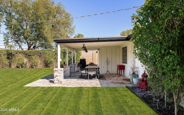 view of patio / terrace featuring a ceiling fan