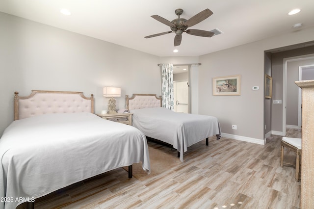 bedroom featuring ceiling fan and light hardwood / wood-style flooring