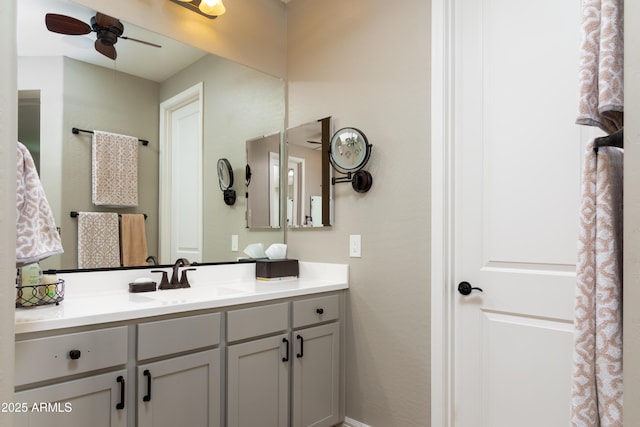 bathroom featuring vanity and ceiling fan