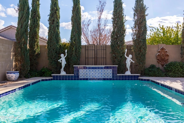 view of pool with pool water feature