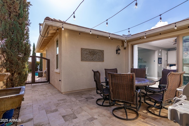 back of house with a patio